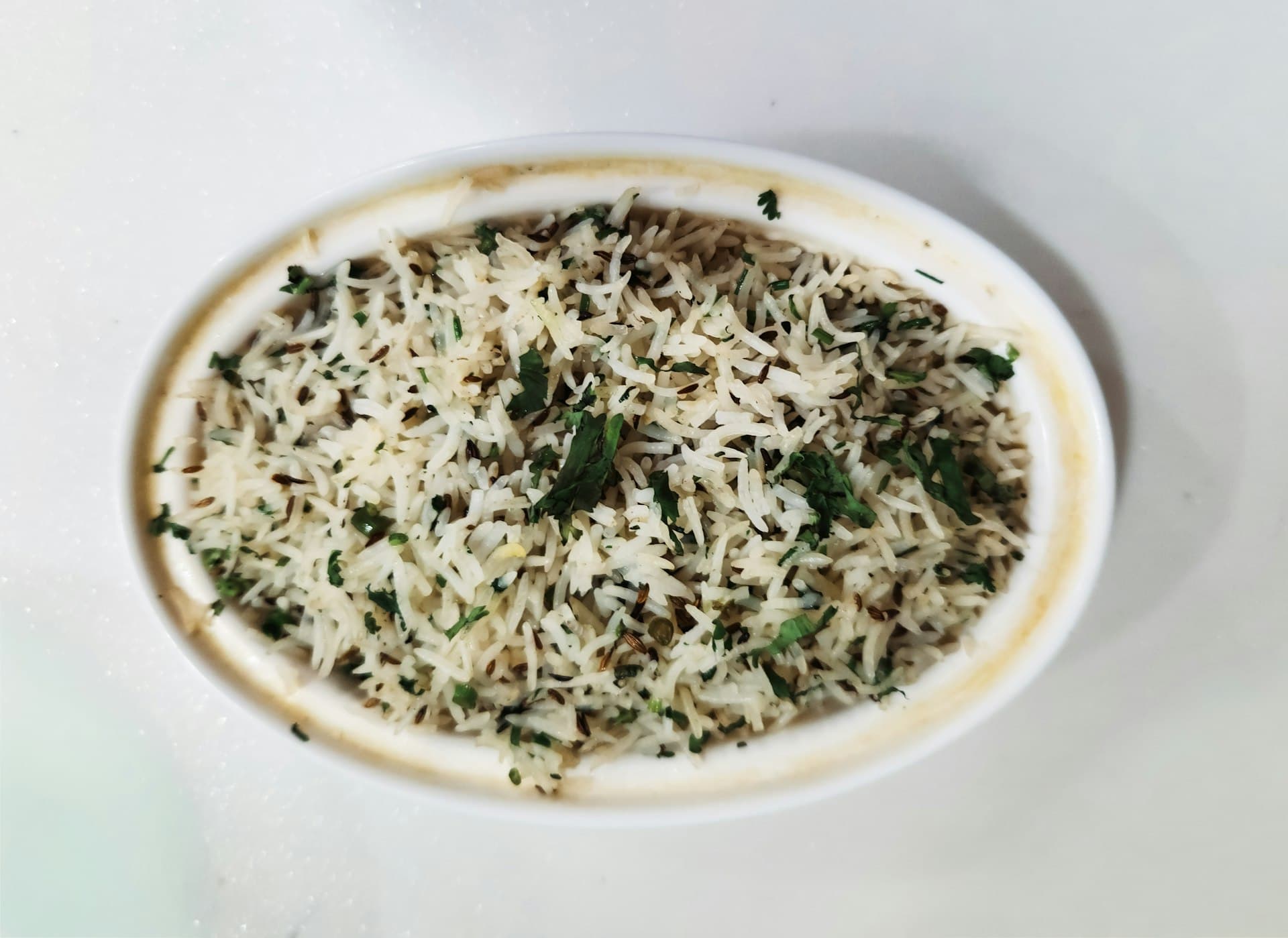 A bowl of jeera rice ready to serve